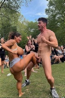 Woman beats a man, then busts his balls.